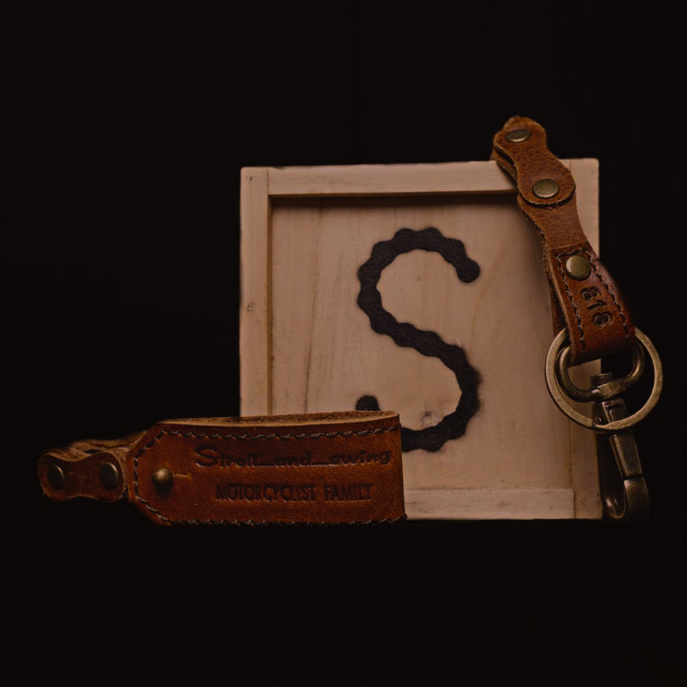 Buy stroll & swing walnut keychain at Riderz Planet